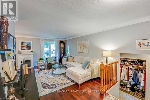 3195 St. Patrick Avenue, Niagara Falls (206 - Stamford), ON - Indoor Photo Showing Living Room With Fireplace