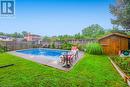 3195 St. Patrick Avenue, Niagara Falls (206 - Stamford), ON  - Outdoor With In Ground Pool With Backyard 