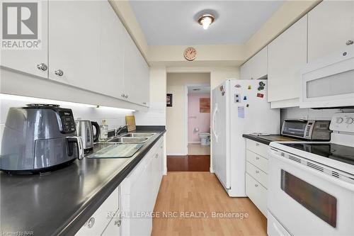 710 - 5100 Dorchester Road, Niagara Falls (212 - Morrison), ON - Indoor Photo Showing Kitchen With Double Sink