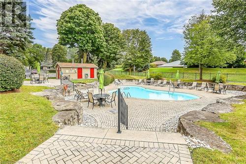 710 - 5100 Dorchester Road, Niagara Falls (212 - Morrison), ON - Outdoor With In Ground Pool With Backyard