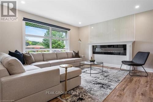 190 Lakeshore Road, St. Catharines (442 - Vine/Linwell), ON - Indoor Photo Showing Living Room With Fireplace