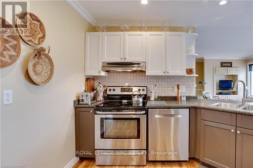 454 Holloway Bay Road S, Port Colborne (874 - Sherkston), ON - Indoor Photo Showing Kitchen With Double Sink