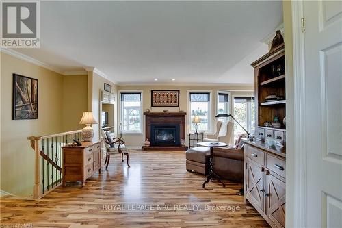 454 Holloway Bay Road S, Port Colborne (874 - Sherkston), ON - Indoor Photo Showing Living Room With Fireplace