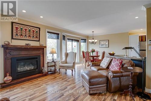 454 Holloway Bay Road S, Port Colborne (874 - Sherkston), ON - Indoor Photo Showing Living Room With Fireplace