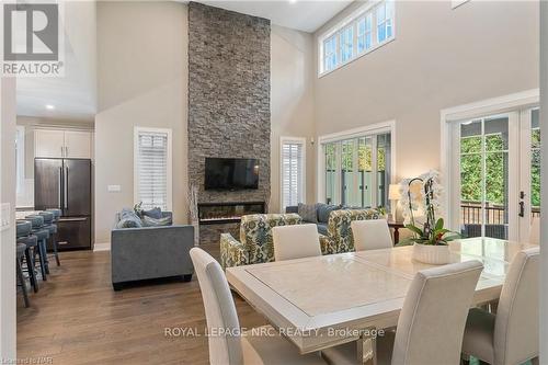 18 - 30 Power Glen, St. Catharines (462 - Rykert/Vansickle), ON - Indoor Photo Showing Dining Room With Fireplace