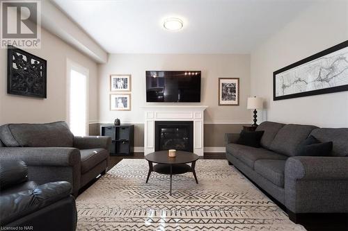 23 Willowbrook Drive, Welland (770 - West Welland), ON - Indoor Photo Showing Living Room With Fireplace