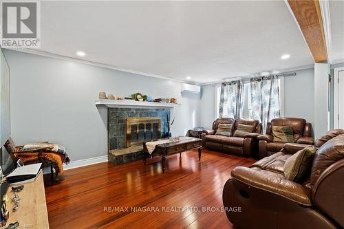 1900 Garrison Road, Fort Erie (334 - Crescent Park), ON - Indoor Photo Showing Living Room With Fireplace