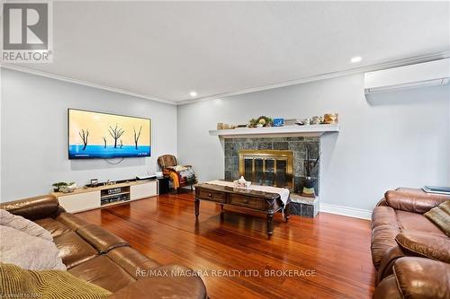 1900 Garrison Road, Fort Erie (334 - Crescent Park), ON - Indoor Photo Showing Living Room With Fireplace