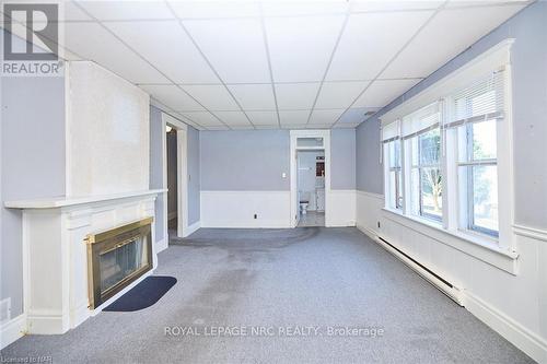 16-16.5 Lakeside Drive, St. Catharines (436 - Port Weller), ON - Indoor Photo Showing Other Room With Fireplace