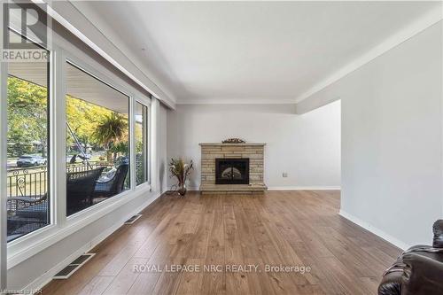 8791 Parliament Avenue, Niagara Falls (223 - Chippawa), ON - Indoor Photo Showing Living Room With Fireplace