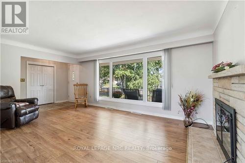 8791 Parliament Avenue, Niagara Falls (223 - Chippawa), ON - Indoor Photo Showing Living Room With Fireplace