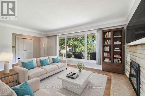 8791 Parliament Avenue, Niagara Falls (223 - Chippawa), ON - Indoor Photo Showing Living Room With Fireplace