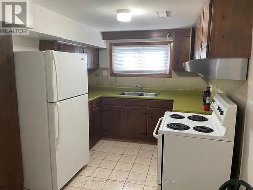 66 Evans Avenue, Toronto, ON - Indoor Photo Showing Kitchen With Double Sink