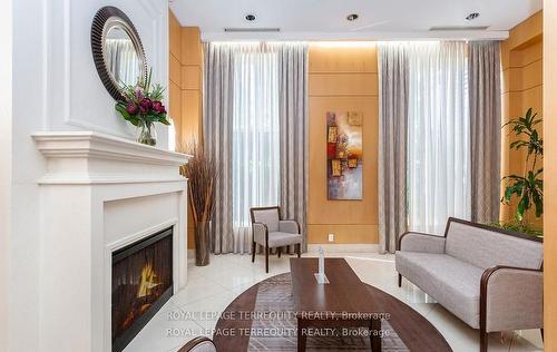 1408-8 Mckee Ave, Toronto, ON - Indoor Photo Showing Living Room With Fireplace