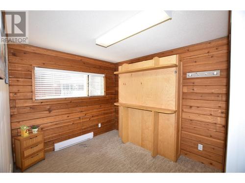 bedroom 2 with a murphy bed - 36 Lakeshore Drive, Vernon, BC - Indoor Photo Showing Other Room