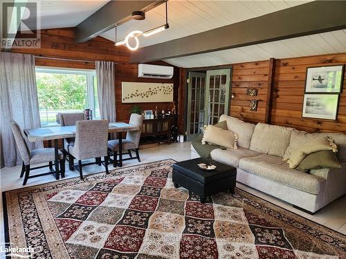 209342 26, Blue Mountains (Blue Mountain Resort Area), ON - Indoor Photo Showing Living Room