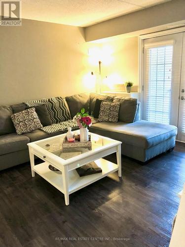 208 - 1360 Main Street E, Milton, ON - Indoor Photo Showing Living Room