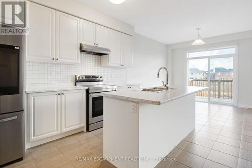 13 Cahill Drive, Brantford, ON - Indoor Photo Showing Kitchen With Double Sink With Upgraded Kitchen