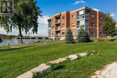 107 - 210 Main Street E, Haldimand, ON - Outdoor With Balcony With Facade