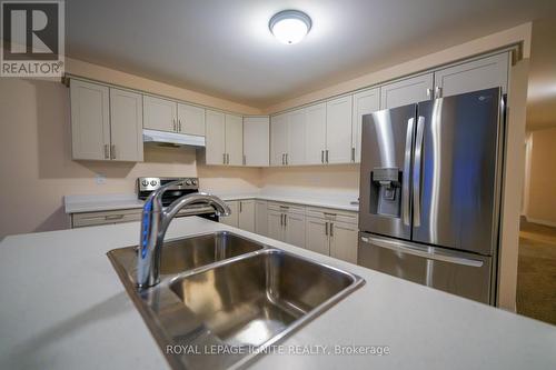 16 Braeburn Street, Brighton, ON - Indoor Photo Showing Kitchen With Double Sink