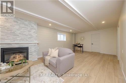 2640 9Th Avenue E, Owen Sound, ON - Indoor Photo Showing Living Room With Fireplace