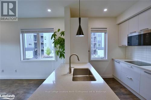 207 - 11 Beckwith Lane, Blue Mountains (Blue Mountain Resort Area), ON - Indoor Photo Showing Kitchen