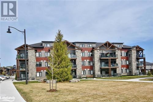 207 - 11 Beckwith Lane, Blue Mountains (Blue Mountain Resort Area), ON - Outdoor With Balcony With Facade