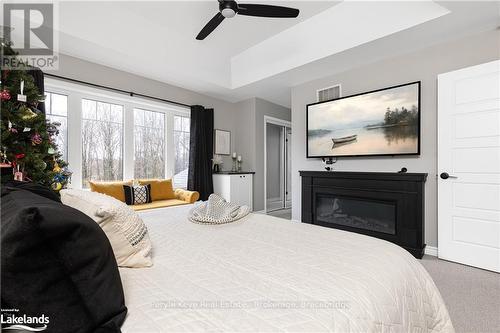 80 Chambery Street, Bracebridge (Macaulay), ON - Indoor Photo Showing Bedroom With Fireplace