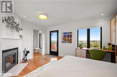 6398 Second Line, Centre Wellington, ON - Indoor Photo Showing Bedroom With Fireplace