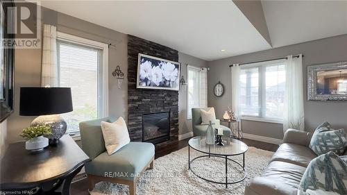 71 Clayton Street, West Perth (Mitchell), ON - Indoor Photo Showing Living Room With Fireplace