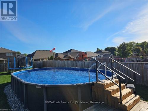 71 Clayton Street, West Perth (Mitchell), ON - Outdoor With Above Ground Pool With Backyard