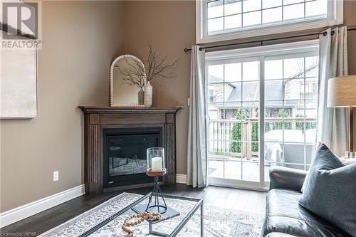 221 - 50 Galt Road Road, Stratford, ON - Indoor Photo Showing Living Room With Fireplace