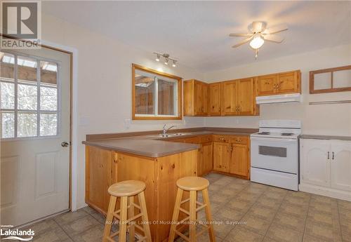 1125 Fairy Falls Road, Lake Of Bays (Mclean), ON - Indoor Photo Showing Kitchen With Double Sink