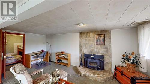 583301 60 Side Road, Chatsworth, ON - Indoor Photo Showing Other Room With Fireplace