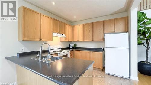 8 Macpherson Avenue, Huron East (Egmondville), ON - Indoor Photo Showing Kitchen With Double Sink