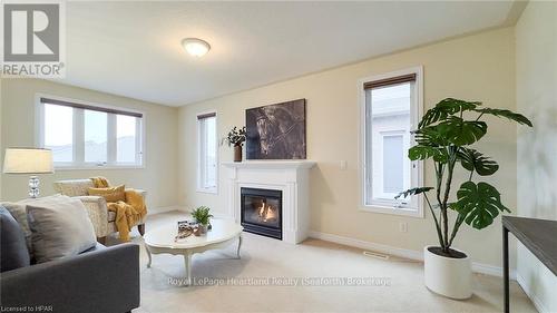 8 Macpherson Avenue, Huron East (Egmondville), ON - Indoor Photo Showing Living Room With Fireplace