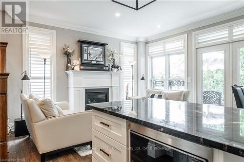 109 - 362 Fairview Street, Wilmot, ON - Indoor Photo Showing Living Room With Fireplace