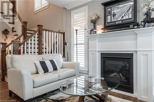 109 - 362 Fairview Street, Wilmot, ON - Indoor Photo Showing Living Room With Fireplace