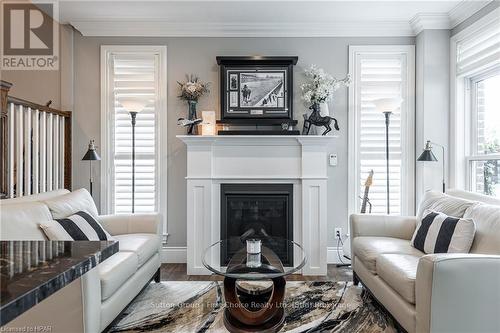 109 - 362 Fairview Street, Wilmot, ON - Indoor Photo Showing Living Room With Fireplace