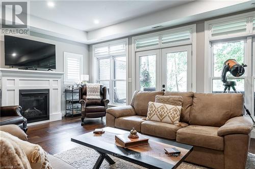 109 - 362 Fairview Street, Wilmot, ON - Indoor Photo Showing Living Room With Fireplace