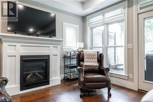 109 - 362 Fairview Street, Wilmot, ON - Indoor Photo Showing Living Room With Fireplace