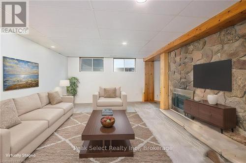 196340 Line 19, Zorra, ON - Indoor Photo Showing Living Room With Fireplace