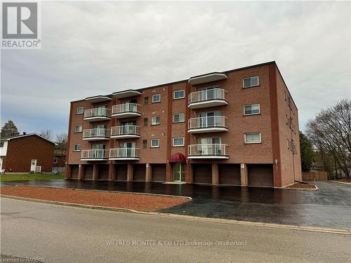 304 - 203 Mcnabb Street, Brockton, ON - Outdoor With Balcony With Facade