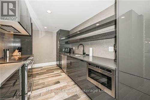 801 - 73 Arthur Street S, Guelph (Two Rivers), ON - Indoor Photo Showing Kitchen With Stainless Steel Kitchen With Upgraded Kitchen