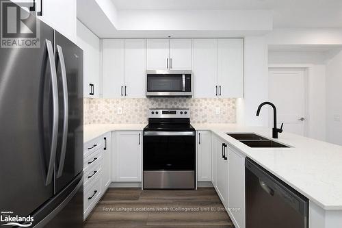 318 - 4 Kimberly Lane, Collingwood, ON - Indoor Photo Showing Kitchen With Double Sink With Upgraded Kitchen