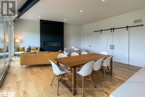 133 Young Drive, Grey Highlands, ON - Indoor Photo Showing Dining Room With Fireplace