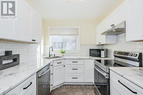 C28 - 427 Victoria Road N, Guelph (Brant), ON - Indoor Photo Showing Kitchen With Stainless Steel Kitchen With Upgraded Kitchen