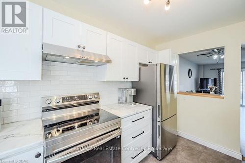 C28 - 427 Victoria Road N, Guelph (Brant), ON - Indoor Photo Showing Kitchen With Stainless Steel Kitchen