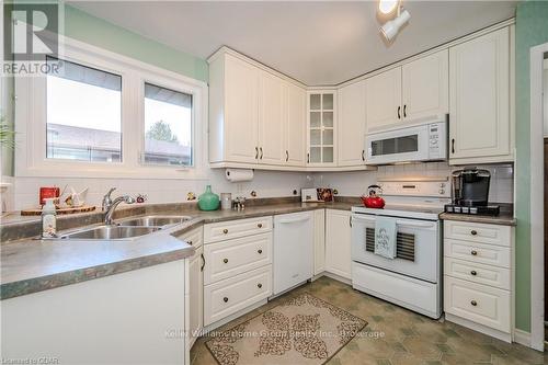 4 Lambert Crescent, Guelph (College), ON - Indoor Photo Showing Kitchen With Double Sink