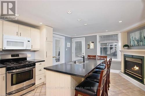 497 Brunswick Street, Stratford, ON - Indoor Photo Showing Kitchen With Fireplace